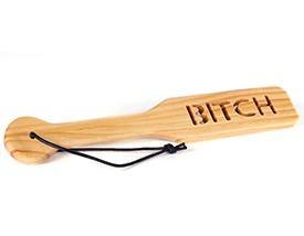 WOOD PADDLE WITH WORD "BITCH" IMPRINT